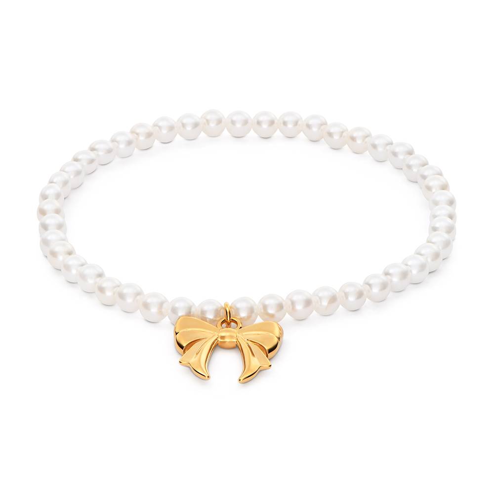 The Petite Pearl Bow Bracelet in Gold Plating-1 The Petite Pearl Bow Bracelet in Gold Plating-1 product photo